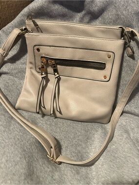 Neutral Cream Crossbody Bag with Front Zip Tassels